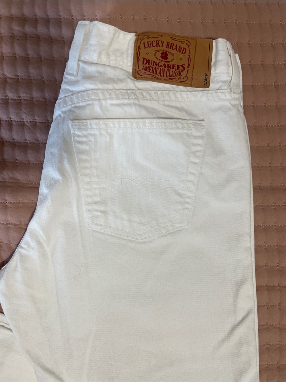 Lucky Brand White mid-rise flareJeans with Leather Patch